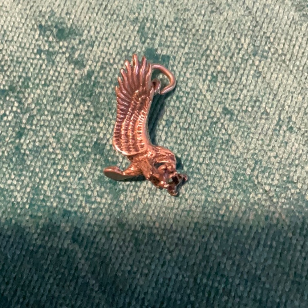 Vintage Eagle charm very detailed w. sharp beak to his outstretched claws.